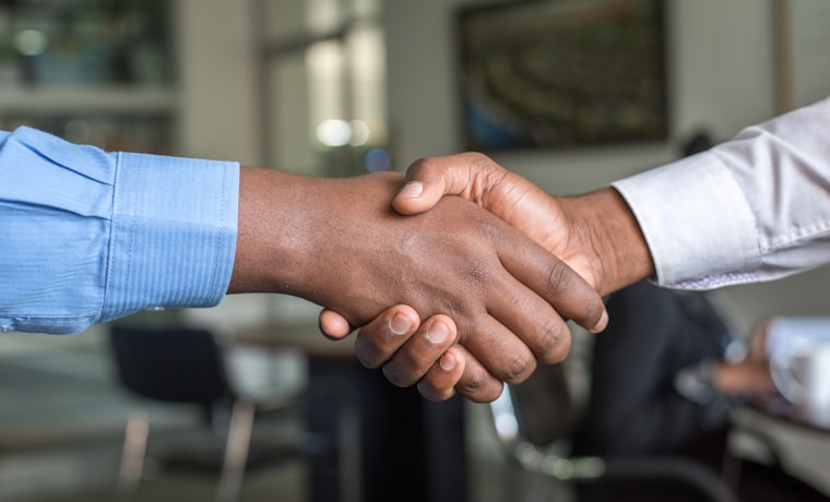 Business handshake representing procurement partnership